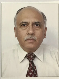 Dr. Krishan Kapur